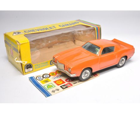 Bandai Tinplate Friction Driven Chevrolet Camaro. Orange, in working order. Displays very good with only odd minor signs of w