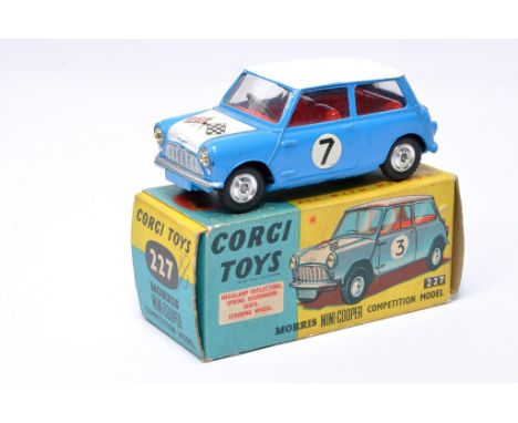 Corgi No. 227 Morris Mini Cooper Competition Model. Blue with red interior, RN7, flag decal, plus chrome hubs. Displays gener