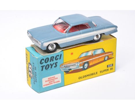 Corgi No. 235 Oldsmobile Super 88. Blue / white with red interior. Chrome hubs. Displays excellent with little sign of wear. 