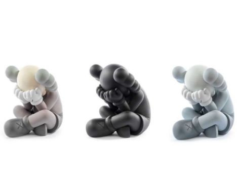Kaws (American 1974-), 'Separated', 2020, a complete set of three cast vinyl figures, stamped to the undersides of all three 