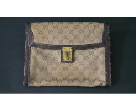 A vintage Gucci clutch handbag, marked Gucci, with dust bag. H.20 W.26cm 
