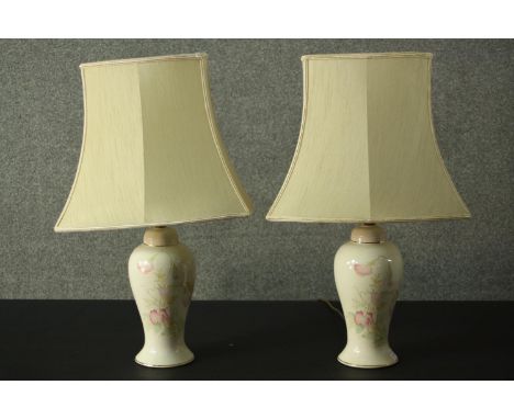 A pair of ceramic baluster form table lamps and a similar marble example. H.63cm (largest) 