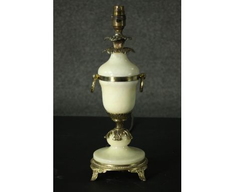 A vintage gilt metal and ceramic baluster form table lamp. H.37cm. 