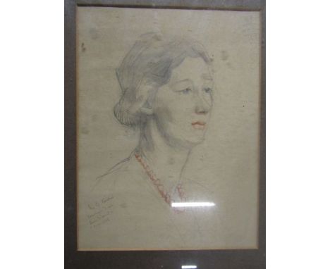 A  pencil portrait, signed