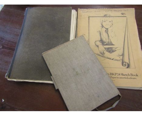 Sketch books full of drawings and paintings
