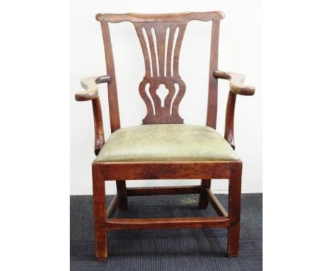 George III chippendale arm chair in figured walnut with fretted slat upswept arms on square chamfered legs with leather seat.