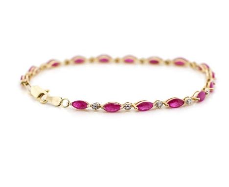 Ruby and diamond set 10ct yellow gold bracelet marked 10k. Approx length 19cm, 4.2 grams
