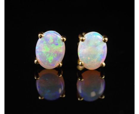 Opal set 18ct yellow gold stud earrings marked 750.Approx weight 1.6 grams
