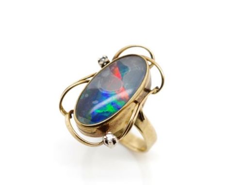 Mid century 9ct yellow gold, opal triplet ring also set with two eight cut diamonds. Approx weight of ring 4.8 grams, ring si