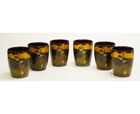 Six Royal Doulton golfing Kingsware beakers C1920's,decorated in low relief golfer &amp; his caddy, after designs by Charles 