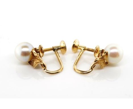Pearl and 18ct yellow gold ear clips marked 18 to screw backs. Approx pearl size 7mm, total weight 1.88 grams