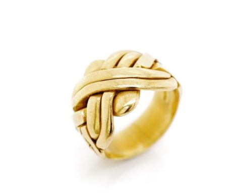 21ct yellow gold knot ring marked 21k. Approx weight 9.6 grams, ring size K