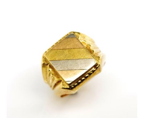 Tri colour 18ct yellow gold signet ring marked 750. Approx weight 11.33 grams, ring size R-S