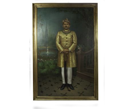 INDIAN SCHOOL (LATE 19TH/EARLY 20TH CENTURY) Full length portrait of an Indian prince dressed in traditional costume holding 