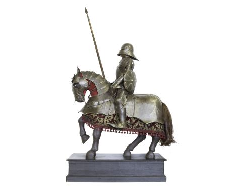 A VERY FINE QUARTER SCALE MUSEUM DISPLAY MODEL OF A MOUNTED PAGEANT KNIGHT, fully articulated and handmade with embossed stee