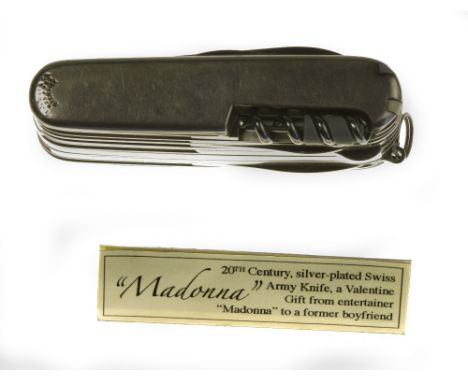 A 'TIFFANY & CO.' SWISS ARMY STYLE SILVER PLATED KNIFE, engraved 'Birdy, Be My Valentine, Love M', a gift from the entertaine