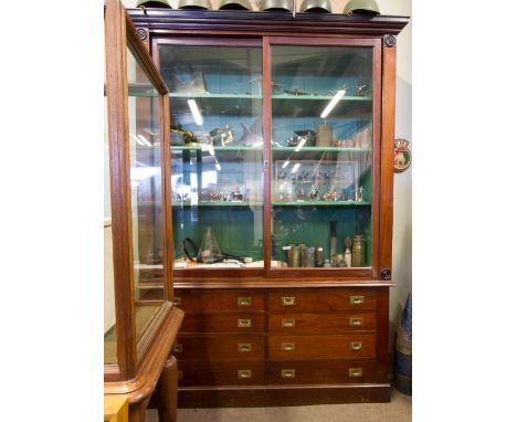 A LARGE VICTORIAN MAHOGANY GLAZED BOOKCASE, the glazed upper section having two sliding doors above an arrangement of eight d