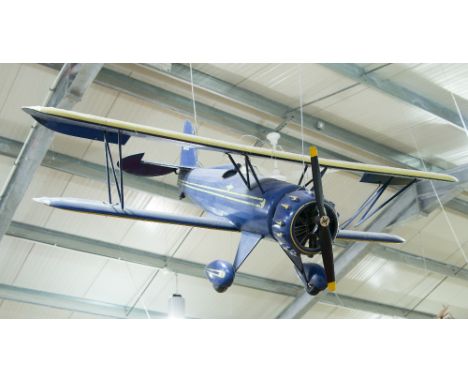 A SCALE MODEL OF A WACO UPF-7 AIRCRAFT TOGETHER WITH AN RAF TIGER MOTH, the Waco aircraft body painted in blue with yellow un