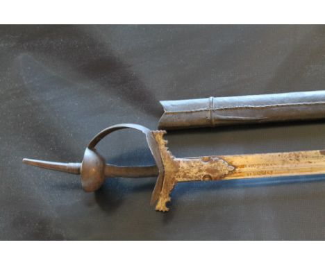 AN 18TH CENTURY INDIAN FIRANGI SWORD, with a straight 102 cm blade, maker's marks, full knuckle/hand guard with 10 cm spike a