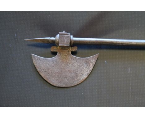AN 18TH CENTURY INDIAN BATTLE AXE, decorative blade with 6 cm top spike, threaded bolt to rear of axe head indicating a missi