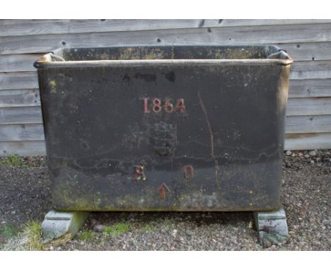 A LARGE VICTORIAN CAST IRON OFFICER'S MESS CISTERN, of rectangular form, with raised shield, three cannon and letters 'B &amp