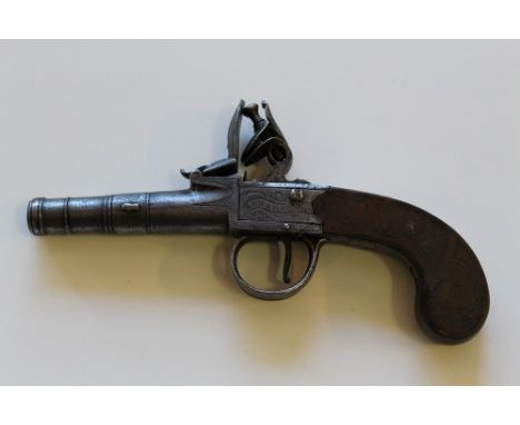 AN 18TH CENTURY FLINTLOCK CANNON BARREL PISTOL, signed 'T Sharp Stratford', engraved decoration to side panels with shaped tr