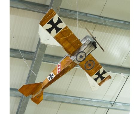 A SCALE MODEL OF A WWI GERMAN FOKKER EIII BIPLANE TOGETHER WITH AN RAF GYPSY MOTH, the biplane painted in brown with silver f