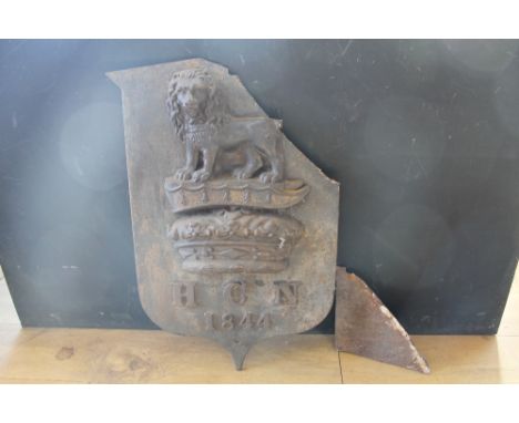 A CAST IRON DRAIN HOPPER COVER PLATE DISPLAYING A LION STANANT GUARDANT OVER CROWN AND DATED 1844, the plate cast in the form
