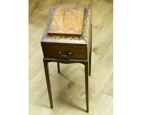 A REGENCY MAHOGANY WORK BOX ON STAND, the box with caddy top and oval detail, hinged lid above a compartment, single drawer b