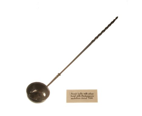 A WHITE METAL TODDY LADLE with marine handle, inset with Shakespeare medal, dated 1769, to commemorate the Jubilee of Shakesp