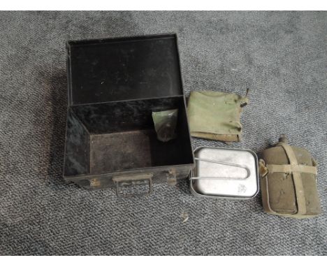 A WW2 ARP Tin containing Water Bottle, two Food Tins, ARP Whistle and a pair of small Gaiters along with a Mess/Survival Tin 