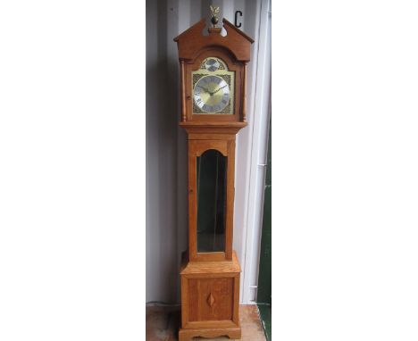 C20th light oak long cased clock, arched dial above glazed door on panel base with bracket feet, H200cm 