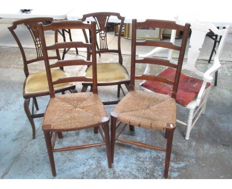 Pair of Edwardian inlaid mahogany salon chairs, pair of oak rush seat ladder back dining chairs and a white painted elbow cha