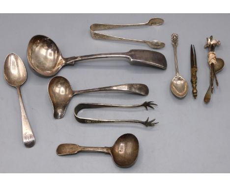 Collection of silver ladles, sugar tongs, spoons, five cocktail skewers &amp; a metal compass, all silver pieces have various