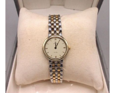 Ladies Omega De Ville stainless steel and gold plated quartz wristwatch on integrated bracelet, signed champagne Roman and ba