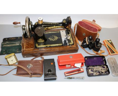 Singer oak cased hand operated sewing machine serial no.F2331693, Remington cased Quiet-Riter typewriter, Prinz 300 slide pro