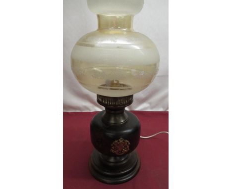 Oil lamp converted to electric with wooden base and brass crests (missing chimney) 
