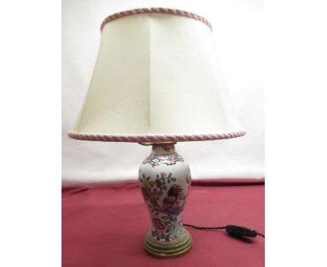 C20th table lamp, baluster body decorated in Famille enamels, gilt metal base and cream shade, H50cm max 