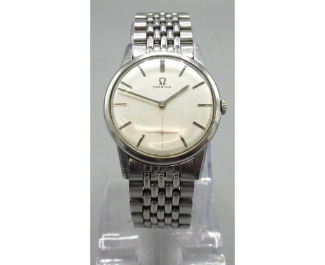 1960's Omega stainless steel wristwatch, signed silvered dial with applied baton hours with subsidiary seconds, three piece c