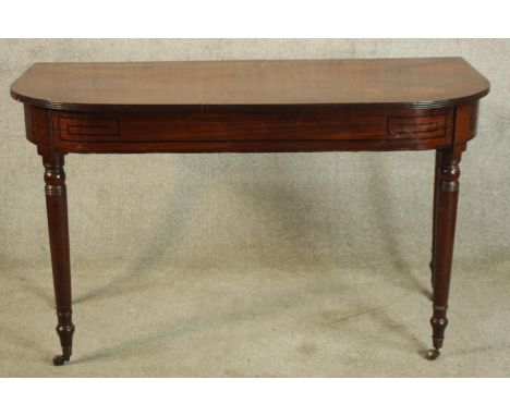 Console table, early 19th century mahogany with ebony inlay. H.72 W.122cm. 