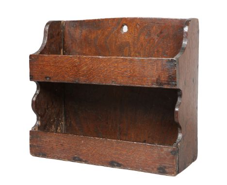 AN 18TH CENTURY OAK DOUBLE WALL SHELF. With hole to the back board for hanging, with two galleried shelves, 31.5cm wide, 27cm