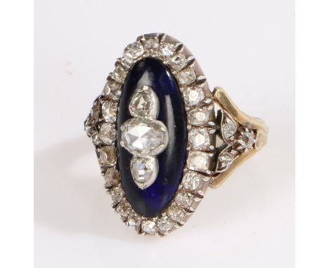 French 19th Century 18 carat gold diamond set ring, with three diamonds to the tip of the head above the deep blue enamel bod