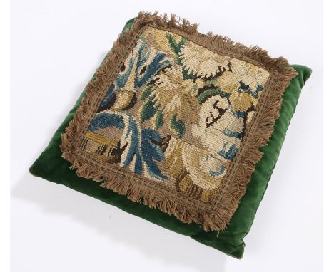 17th Century Flemish embroidered cushion, from Oudenaarde, the square panel with dense flower design, 26cm diameter 