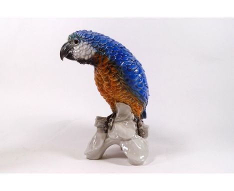 A Goebel porcelain model of a parrot, impressed marks CV 79 and 1967, 21cm high
