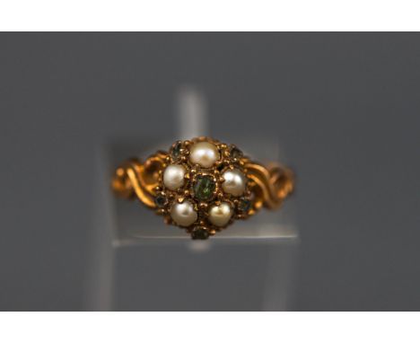 A Victorian 15ct gold, emerald and half-pearl cluster mourning ring, the head centred with a small emerald within five half-p