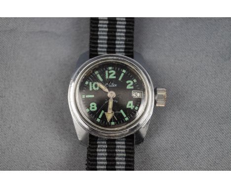 Chilex, a vintage stainless steel round wrist watch, the round black dial with green-luminous alternate Arabic and baton nume