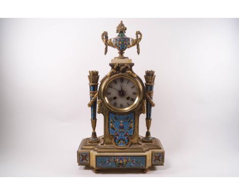 A 19th century French onyx and champleve enamel mantel clock, the onyx dial with Roman numerals, brass surround with Classica