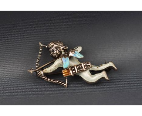 A marcasite and polychrome enamel brooch in the form of Cupid, 37mm high overall.