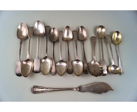 A collection of George III and later silver flatware, comprising; three fiddle pattern tea spoon, a mustard spoon and a salt 