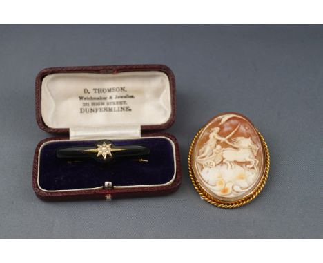 Two brooches, comprising; an early 20th century gold and shell cameo oval brooch depicting Aurora or Eos the goddess of dawn 
